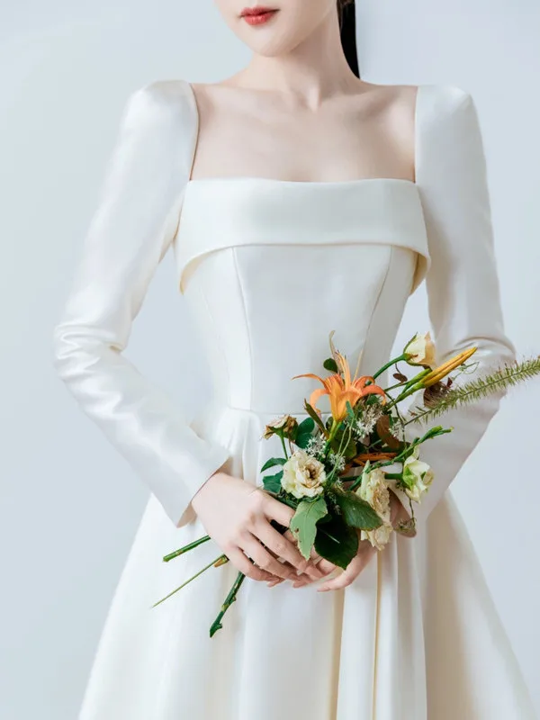 Легкое атласное свадебное платье с длинным рукавом, новинка 2025 года, приталенное, короткое, белое, в корейском стиле, для выездной свадьбы
Легкое атласное свадебное платье с длинным рукавом, новинка 2025 года, приталенное, короткое, белое, в корейском стиле, для выездной свадьбы