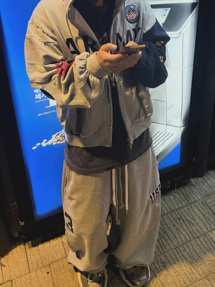 Худи на молнии с контрастными цветовыми блоками, эффектом потертости и прорезями, повседневный свободный крой, длинный рукав, с капюшоном, на молнии
Худи на молнии с контрастными цветовыми блоками, эффектом потертости и прорезями, повседневный свободный крой, длинный рукав, с капюшоном, на молнии