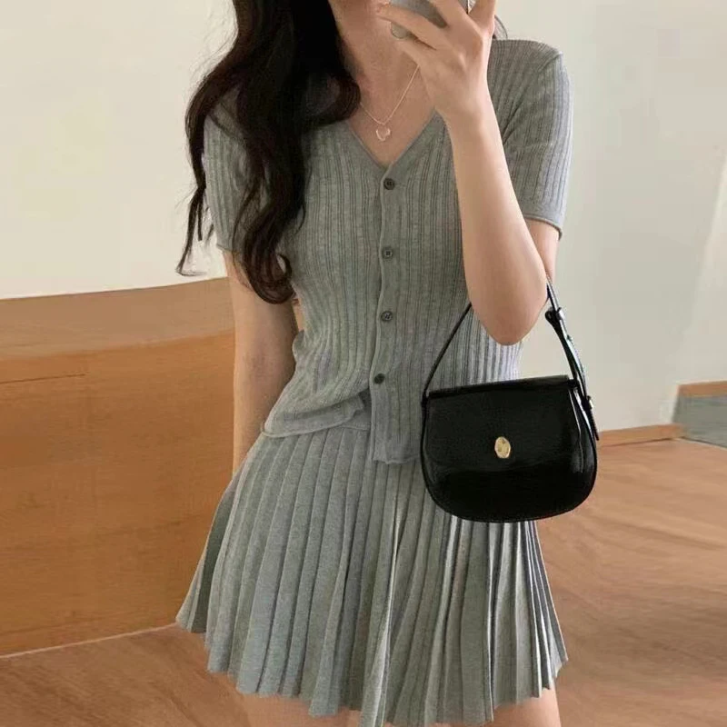 New Slim Knitted Two Piece Set Women Summer V-neck Short Sleeve Tops Cardigan + A-line Mini Skirt Korean Fashion Women's Suit
New Slim Knitted Two Piece Set Women Summer V-neck Short Sleeve Tops Cardigan + A-line Mini Skirt Korean Fashion Women's Suit