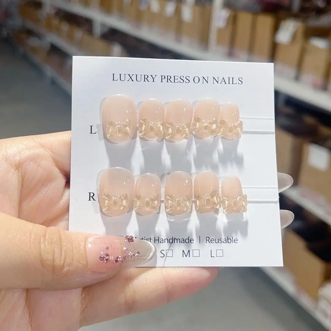 Handmade Press On Nails with Nude Color Butterflies Bow Removable and Reusable High-quality and Luxurious Style.A007
Handmade Press On Nails with Nude Color Butterflies Bow Removable and Reusable High-quality and Luxurious Style.A007