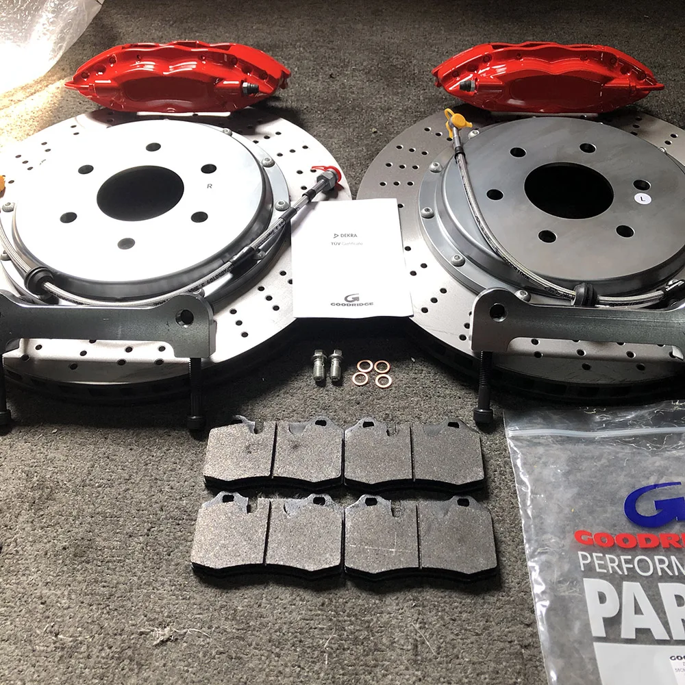 V4 4-поршневые суппорты с тормозными дисками 355*28 мм на заказ для гольфа GTI MK4
V4 4-поршневые суппорты с тормозными дисками 355*28 мм на заказ для гольфа GTI MK4