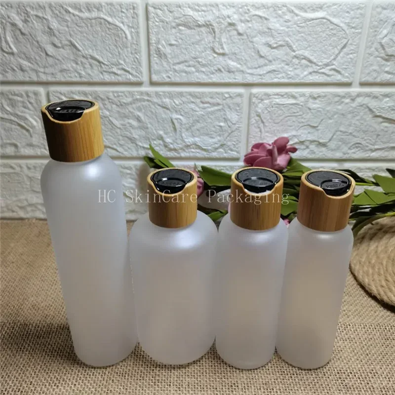 hot sale frosted matte plastic shampoo lotion bottles black/white disc cap with bamboo lid refillable reacycle bottles with caps 
hot sale frosted matte plastic shampoo lotion bottles black/white disc cap with bamboo lid refillable reacycle bottles with caps