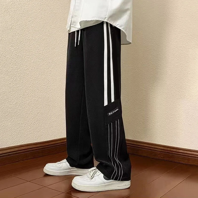 Дышащие легкие спортивные штаны, прямые мужские широкие брюки, спортивная одежда, новые модные повседневные теплые брюки на шнурке, весна-осень
Дышащие легкие спортивные штаны, прямые мужские широкие брюки, спортивная одежда, новые модные повседневные теплые брюки на шнурке, весна-осень