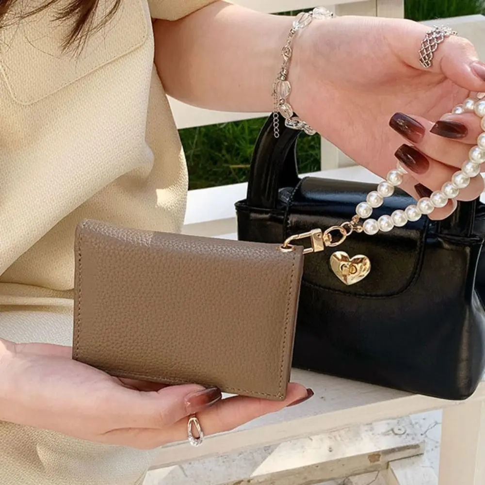 Korean Style Lichee Pattern Wallet Pearls Wrist Chain Solid Color Solid Color Coin Purse Storage Bag Wallets Card Holder Student
Korean Style Lichee Pattern Wallet Pearls Wrist Chain Solid Color Solid Color Coin Purse Storage Bag Wallets Card Holder Student