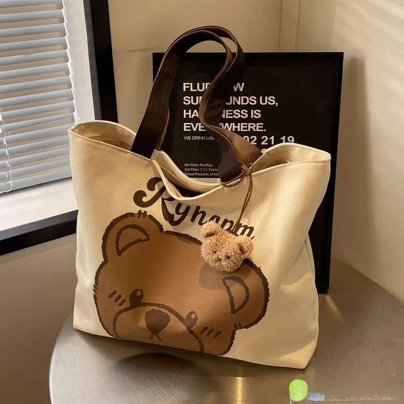 Casual Large Capacity Canvas Tote Bag Women's Summer New Cartoon Bear Bag College Students Class Commuting Single Shoulder Bag
Casual Large Capacity Canvas Tote Bag Women's Summer New Cartoon Bear Bag College Students Class Commuting Single Shoulder Bag