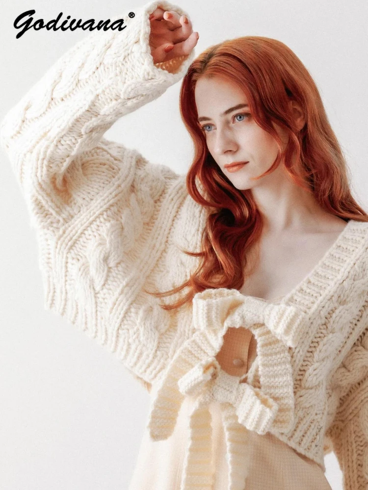 Japanese New Autumn and Winter Sweet Bow Straps 2 Way Twist Knitted Sweater Ladies Pure Color Elegant Loose Short Cardigan Coat
Japanese New Autumn and Winter Sweet Bow Straps 2 Way Twist Knitted Sweater Ladies Pure Color Elegant Loose Short Cardigan Coat