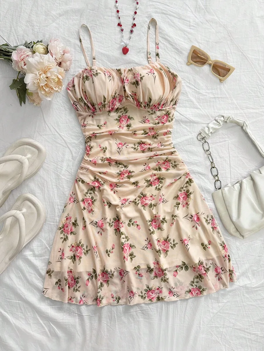 Women's Floral Print Spaghetti Strap Mini Dress with Ruched Bodice and A-Line Skirt
Women's Floral Print Spaghetti Strap Mini Dress with Ruched Bodice and A-Line Skirt