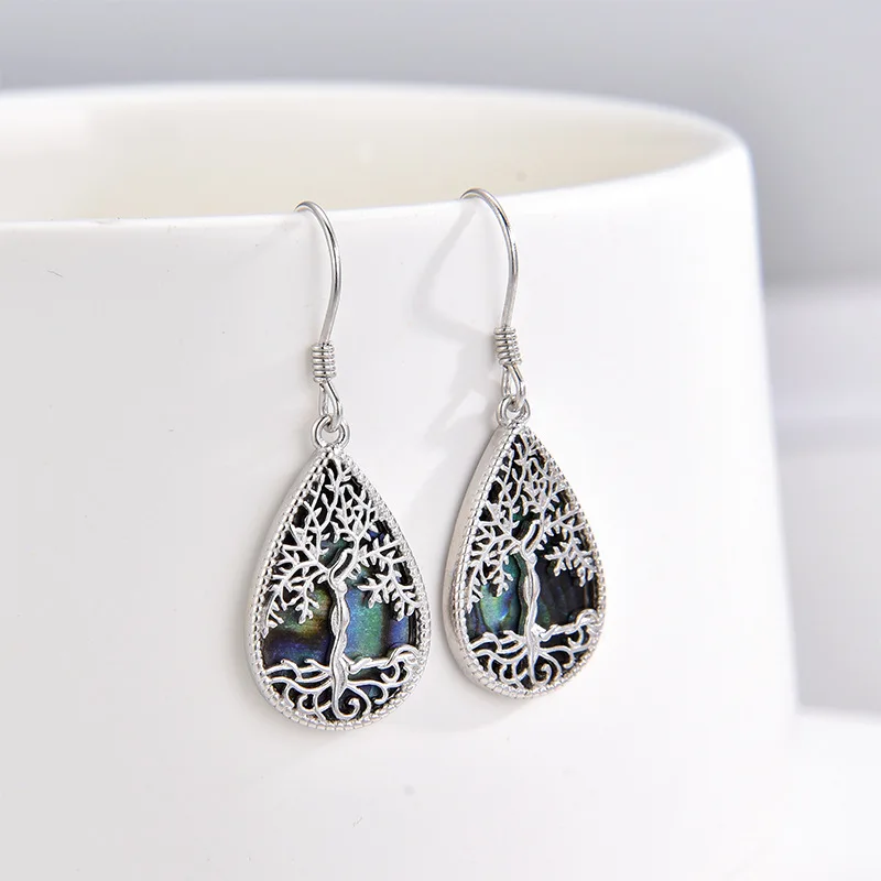 QIBAOKU S925 Sterling Silver Tree of Life Earrings for Women Fashion Luxury Brand High-end Abalone Shell Water Droplet Earrings
QIBAOKU S925 Sterling Silver Tree of Life Earrings for Women Fashion Luxury Brand High-end Abalone Shell Water Droplet Earrings