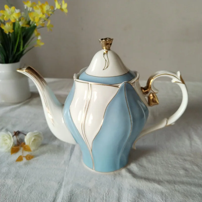 Ceramic teapot European flower shaped coffee pot with tea filtering capacity 1200ml High temperature resistance
Ceramic teapot European flower shaped coffee pot with tea filtering capacity 1200ml High temperature resistance