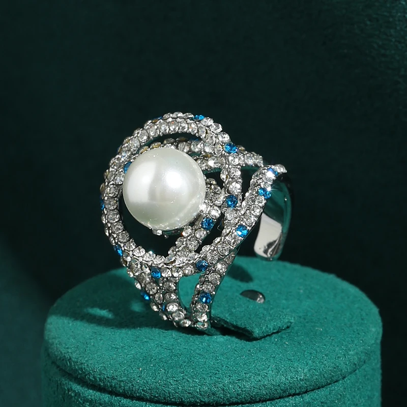 Vintage Rhinestone Blue White Pearl Rings Layered Hollow Large Silver Color Designer Luxury High Women Banquet Wedding Jewelry
Vintage Rhinestone Blue White Pearl Rings Layered Hollow Large Silver Color Designer Luxury High Women Banquet Wedding Jewelry