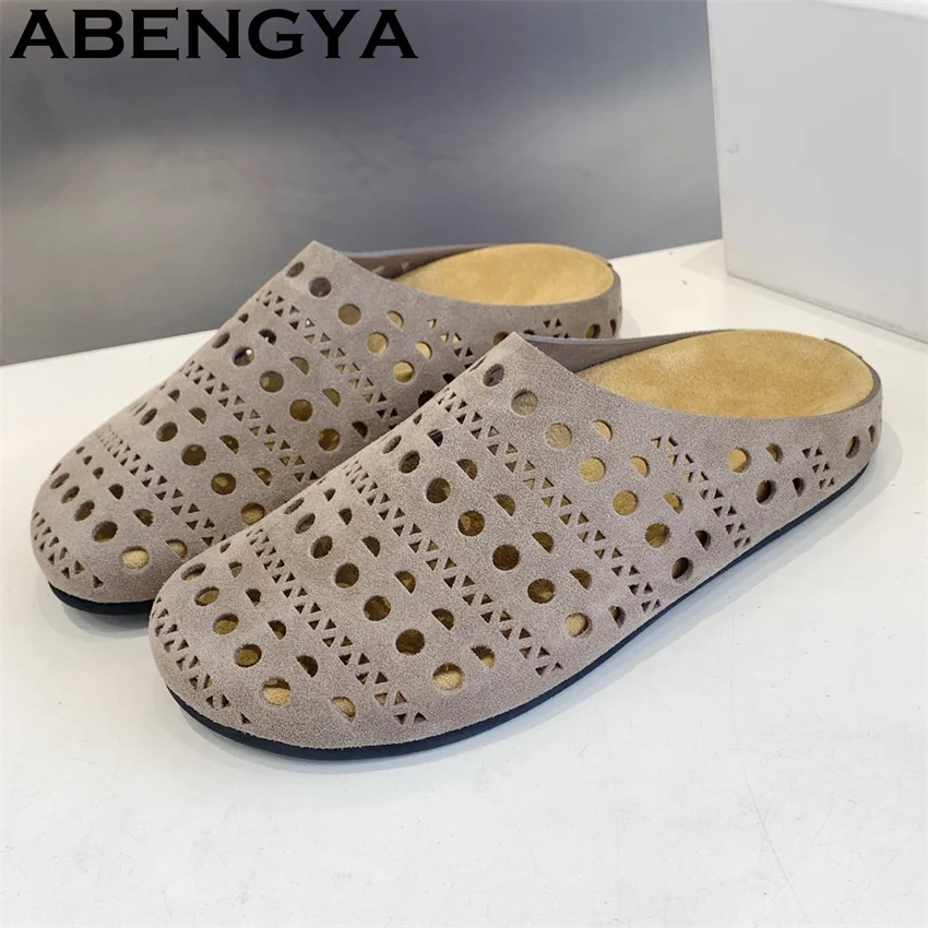 Summer Trendy Obese Casual Breathable Mules Slippers for Woman Suede Leather Hollow loafers Flat Slippers Women zapatillas mujer
Summer Trendy Obese Casual Breathable Mules Slippers for Woman Suede Leather Hollow loafers Flat Slippers Women zapatillas mujer