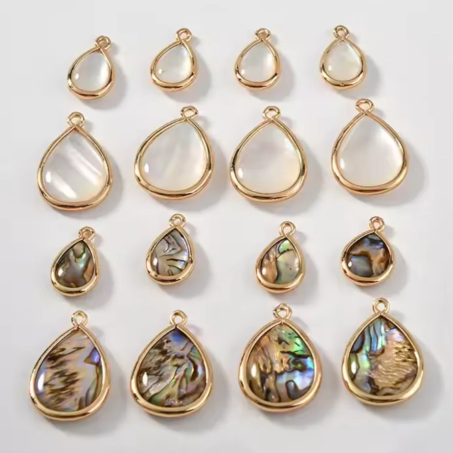 20pcs/ Bag New Hot Sale Colorful Shell Natural Crystal Waterdrop Pendant DIY Jewelry Making accessories
20pcs/ Bag New Hot Sale Colorful Shell Natural Crystal Waterdrop Pendant DIY Jewelry Making accessories