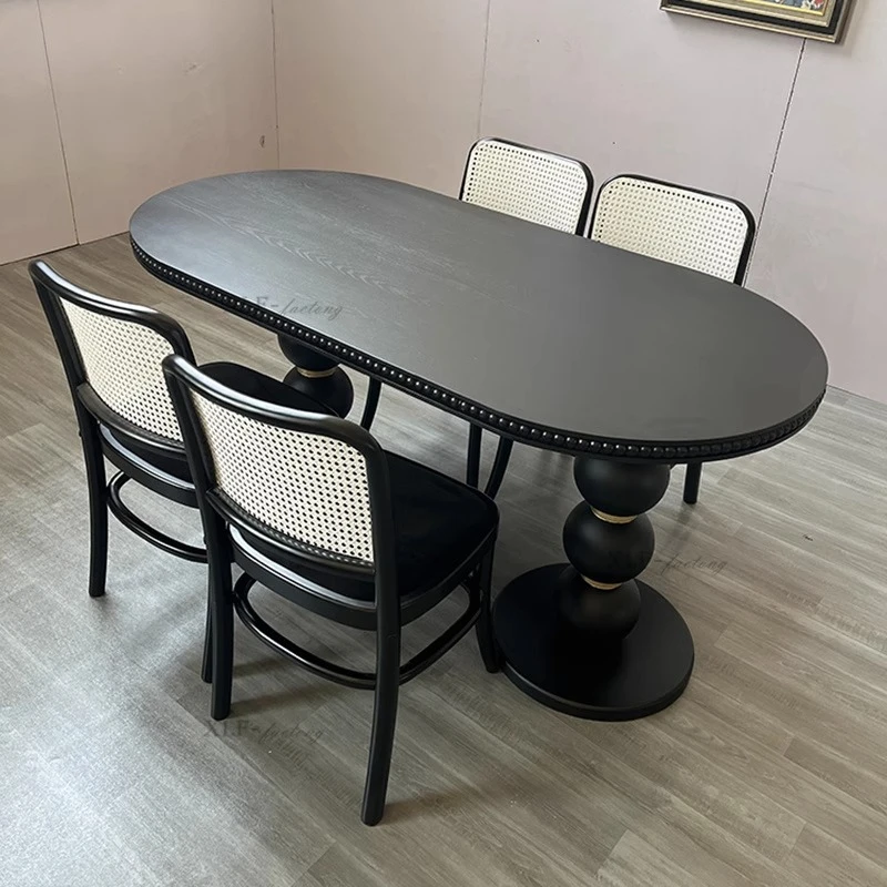 American retro oak solid wood dining table household oval French small apartment Roman column table
American retro oak solid wood dining table household oval French small apartment Roman column table