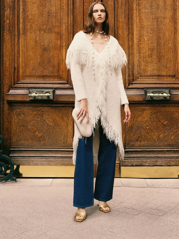 Элегантный бежевый женский длинный вязаный кардиган с открытой передней бахромой, повседневный элегантный свободный свитер с длинными рукавами, женские повседневные свитера для поездок на работу
Элегантный бежевый женский длинный вязаный кардиган с открытой передней бахромой, повседневный элегантный свободный свитер с длинными рукавами, женские повседневные свитера для поездок на работу