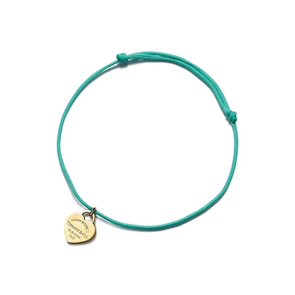 Faionable Titanium Steel Woven Hand Cord Heart aped Luy Charm Simple Design with Lotus Flower Box Versatile Accory
Faionable Titanium Steel Woven Hand Cord Heart aped Luy Charm Simple Design with Lotus Flower Box Versatile Accory
