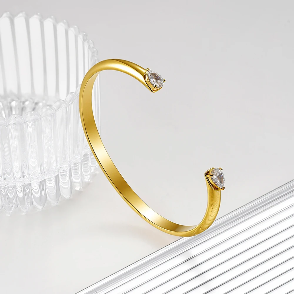 ENFASHION Pulseras C-образный браслет-манжета с открытым дождем и цирконием для женщин, нержавеющая сталь, 18-каратное золото, модные украшения B2666
ENFASHION Pulseras C-образный браслет-манжета с открытым дождем и цирконием для женщин, нержавеющая сталь, 18-каратное золото, модные украшения B2666