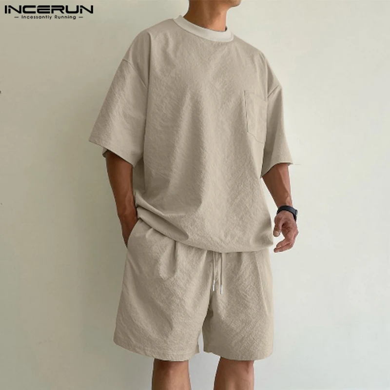 2023 Men Casual Sets Solid Color Loose Streetwear O-neck Short Sleeve T Shirt & Drawstring Shorts 2PCS Men's Suits S-5XL INCERUN
2023 Men Casual Sets Solid Color Loose Streetwear O-neck Short Sleeve T Shirt & Drawstring Shorts 2PCS Men's Suits S-5XL INCERUN