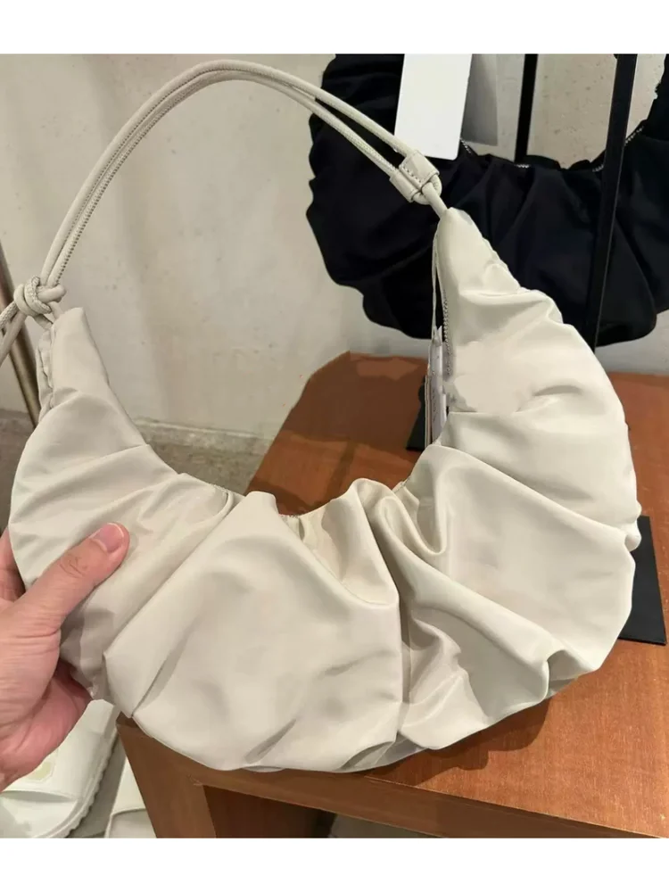 2025 Korean Ins Niche Drawstring Adjustable Cloud Bag Fashion Versatile Large Capacity Commuting Shoulder Bags
2025 Korean Ins Niche Drawstring Adjustable Cloud Bag Fashion Versatile Large Capacity Commuting Shoulder Bags