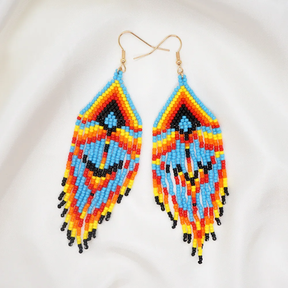 Rice bead earrings Tassel Geometry Rainbow Bohemia Design Originality Hand knitting Alloy Female Fashion Simple Beaded earrings
Rice bead earrings Tassel Geometry Rainbow Bohemia Design Originality Hand knitting Alloy Female Fashion Simple Beaded earrings