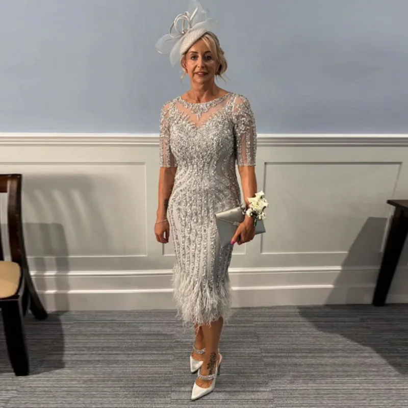 Customized Luxury Tea-Length Mermaid Mother of the Bride Dresses O-Neck Crystal Half Sleeves With Feathers Prom Gown Dress
Customized Luxury Tea-Length Mermaid Mother of the Bride Dresses O-Neck Crystal Half Sleeves With Feathers Prom Gown Dress