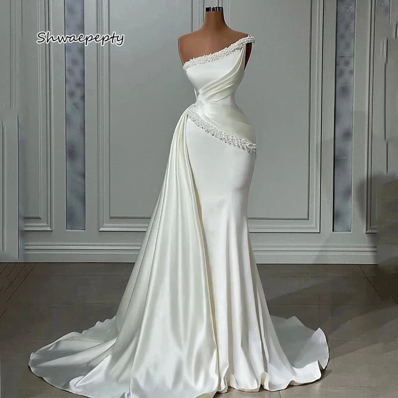 Elegant One Shoulder Wedding Dress With Detachable Peplum 2025 Pearls Beaded Satin Long Bridal Gown Customized
Elegant One Shoulder Wedding Dress With Detachable Peplum 2025 Pearls Beaded Satin Long Bridal Gown Customized