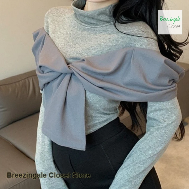 French high-necked long-sleeved T-shirt women's autumn and winter new fashion bow design sense niche with bottoming shirt top.
French high-necked long-sleeved T-shirt women's autumn and winter new fashion bow design sense niche with bottoming shirt top.