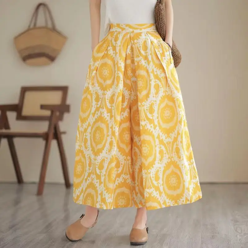 Новые широкие брюки из хлопка и льна с принтом в стиле ретро для женщин, летние тонкие повседневные брюки с эластичной резинкой на талии, юбка с девятью точками
Новые широкие брюки из хлопка и льна с принтом в стиле ретро для женщин, летние тонкие повседневные брюки с эластичной резинкой на талии, юбка с девятью точками