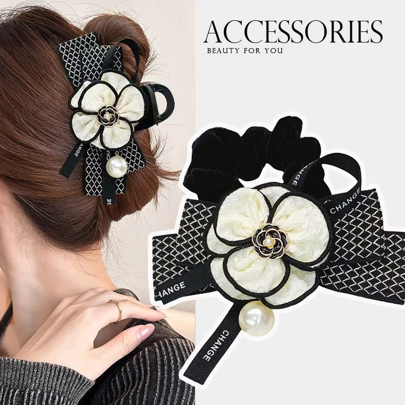 Korean Headwear Fabric Black And White Checkered Bow Grabbing Clip Camellia Flower Shark Temperament Mother's Gift
Korean Headwear Fabric Black And White Checkered Bow Grabbing Clip Camellia Flower Shark Temperament Mother's Gift