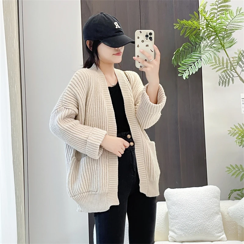 Loose Long Sve Knitted Sweater Women's Casual Sle V-Ne Button-Up Coat Street Faion Single Piece Autumn 2025 Pure Color
Loose Long Sve Knitted Sweater Women's Casual Sle V-Ne Button-Up Coat Street Faion Single Piece Autumn 2025 Pure Color