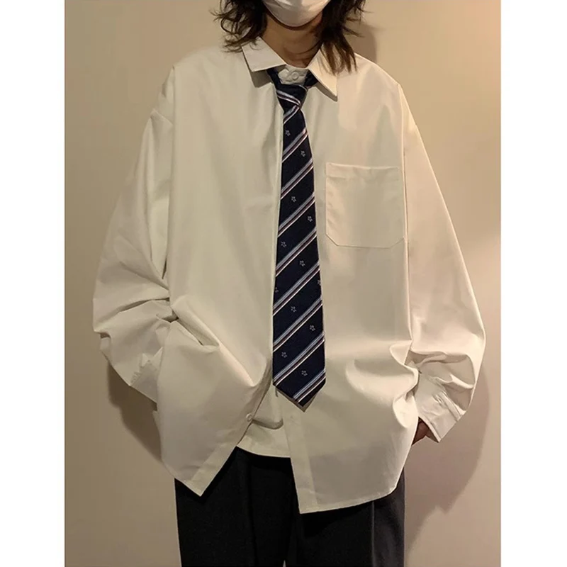 Мужская рубашка American College с длинным рукавом и галстуком, для ношения под костюм, повседневная, модная, однотонная, с воротником-стойкой, свободного кроя
Мужская рубашка American College с длинным рукавом и галстуком, для ношения под костюм, повседневная, модная, однотонная, с воротником-стойкой, свободного кроя