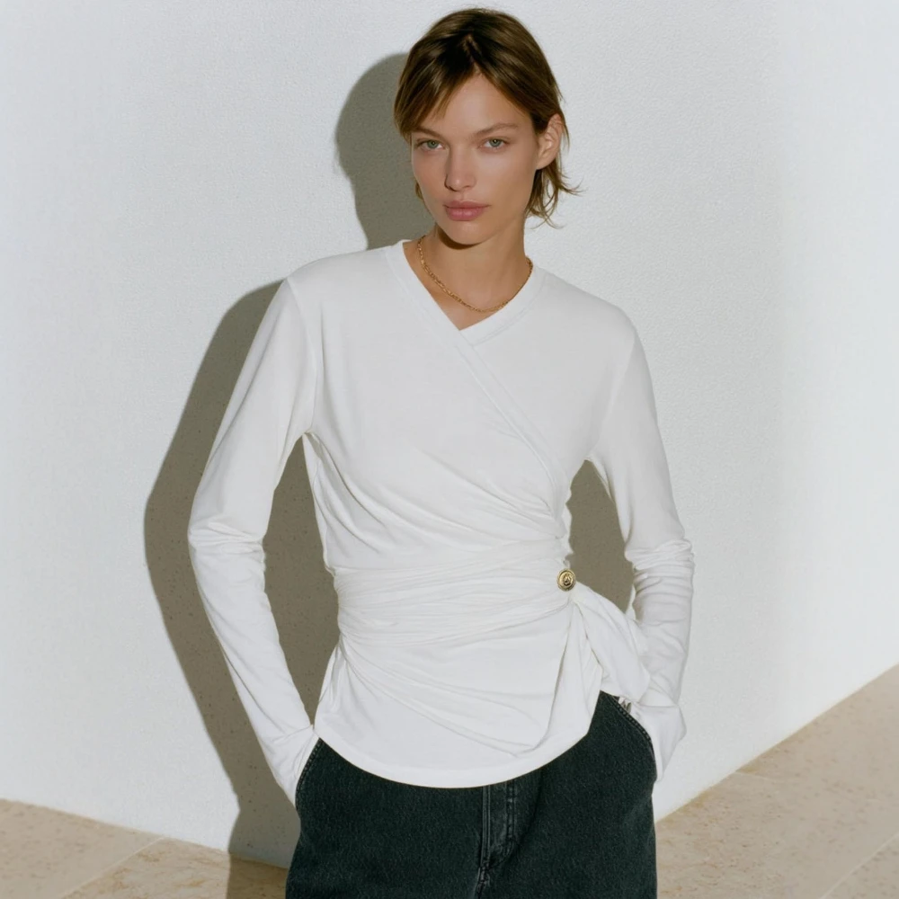 Женская футболка с длинным рукавом и v-образным вырезом, простой боковой декор, сложенный дизайн, повседневная базовая футболка стандартного кроя для
Женская футболка с длинным рукавом и v-образным вырезом, простой боковой декор, сложенный дизайн, повседневная базовая футболка стандартного кроя для