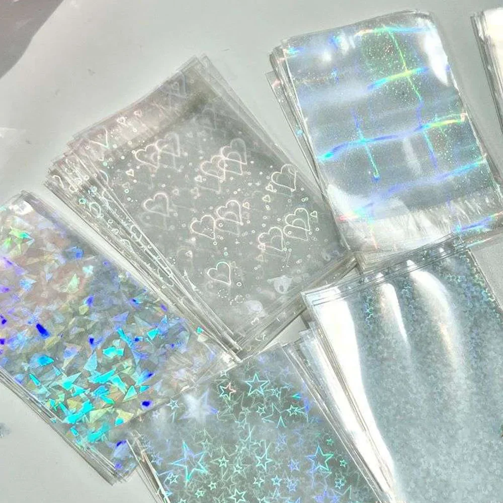 50 шт./упак., голографические защитные рукава для фотокарточек с лазерной любовью, прозрачная пленка для карточек, рукав для фото с изображением идола, INS, упаковочная сумка для подарков
50 шт./упак., голографические защитные рукава для фотокарточек с лазерной любовью, прозрачная пленка для карточек, рукав для фото с изображением идола, INS, упаковочная сумка для подарков