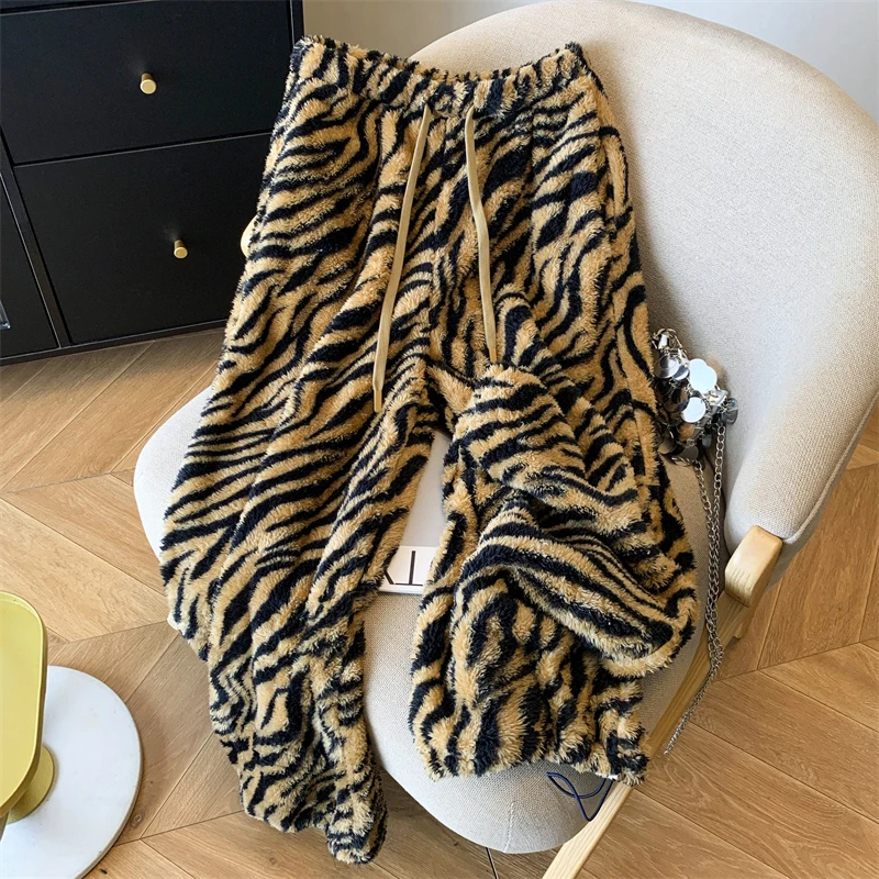 American style drawstring tiger patterned casual pants women autumn and winter new lazy style high waisted wide leg pants
American style drawstring tiger patterned casual pants women autumn and winter new lazy style high waisted wide leg pants