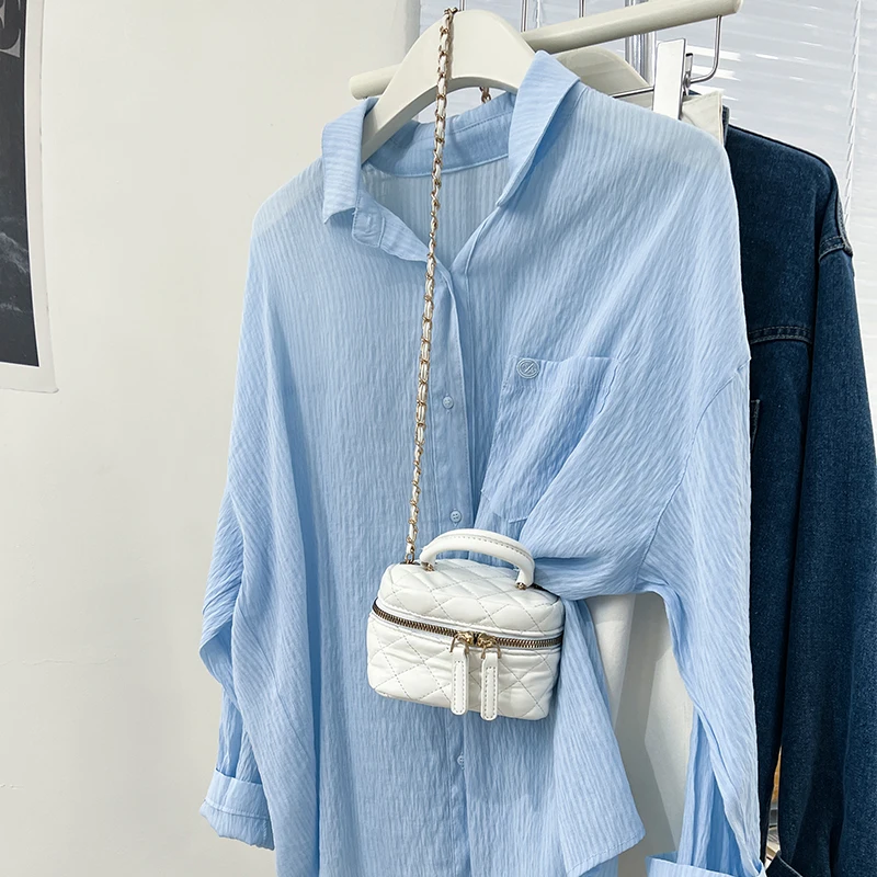 Women's Fashion Solid Color Shirt Thin Long Sleeve Sun Protection Blouse Casual Loose Simple Single-breasted Shirts 2025 New
Women's Fashion Solid Color Shirt Thin Long Sleeve Sun Protection Blouse Casual Loose Simple Single-breasted Shirts 2025 New