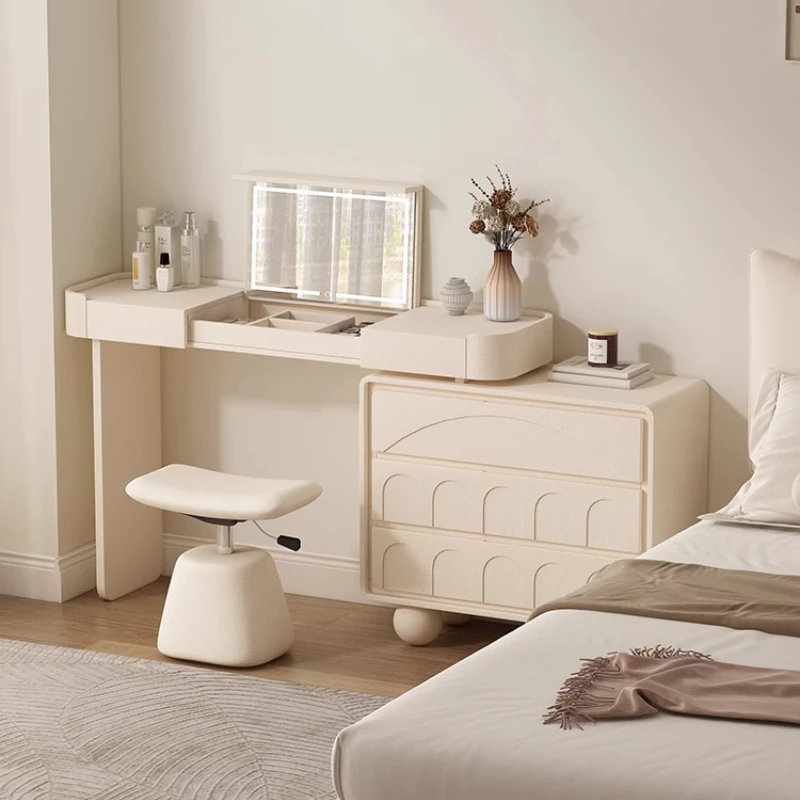 Cream wind retractable dresser, bedside table integrated, bedroom hidden mirror flip table
Cream wind retractable dresser, bedside table integrated, bedroom hidden mirror flip table