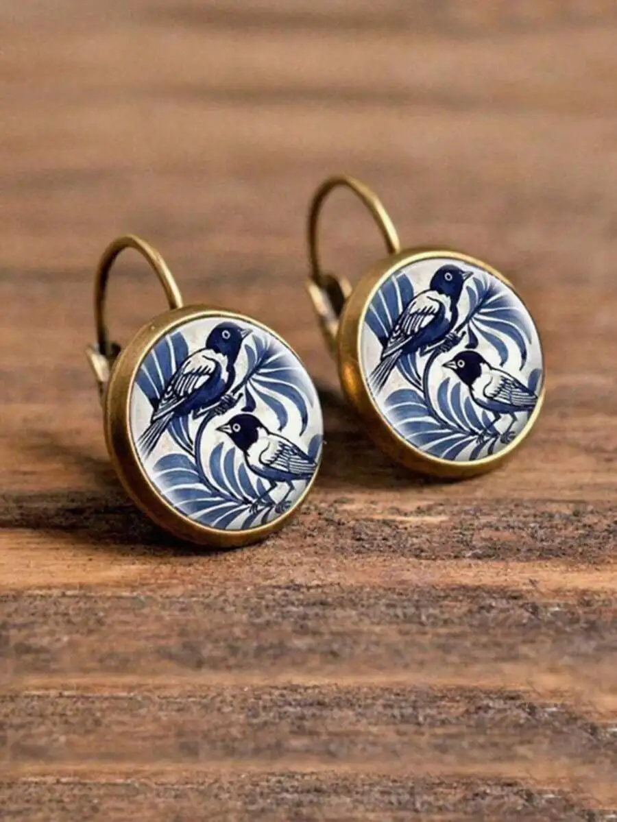 Round Bird Print Earrings With Antique Copper Plated Setting
Round Bird Print Earrings With Antique Copper Plated Setting