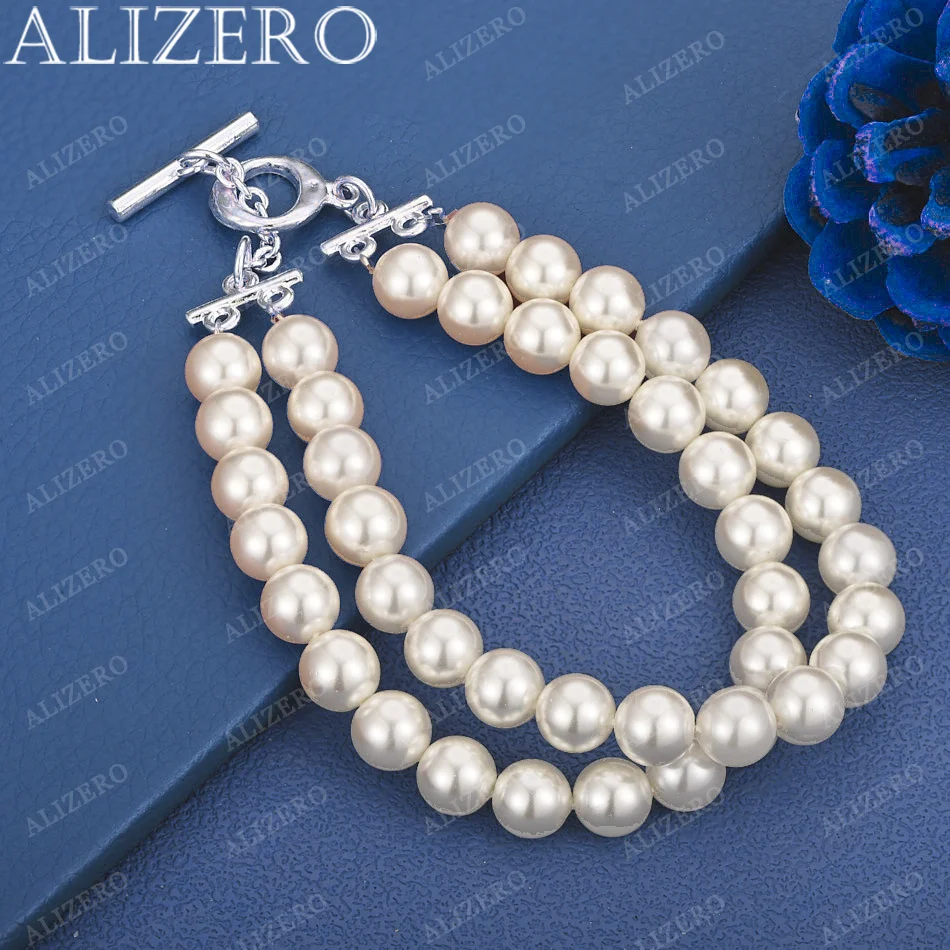 ALIZERO 925 Sterling Silver Double Row Artificial Pearls Chain Bracelet For Women Fashion Wedding Party Luxury Charms Jewelry
ALIZERO 925 Sterling Silver Double Row Artificial Pearls Chain Bracelet For Women Fashion Wedding Party Luxury Charms Jewelry