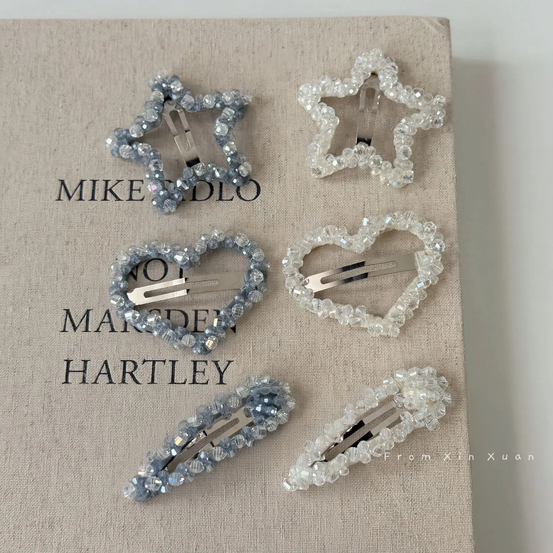 Корейская имитация хрустальной заколки-звезды с пятью лучами, высококачественная заколка для фиксации прядей и челки, новая модель
Корейская имитация хрустальной заколки-звезды с пятью лучами, высококачественная заколка для фиксации прядей и челки, новая модель