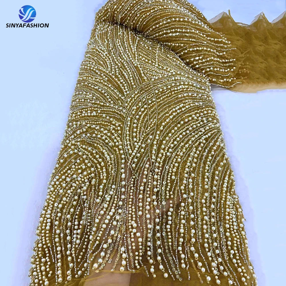 Sinya Heavy Pearls Sequins Gold African Luxury Beaded Lace Fabric High Quality Nigerian Embroidered French Tulle Bridal Lace
Sinya Heavy Pearls Sequins Gold African Luxury Beaded Lace Fabric High Quality Nigerian Embroidered French Tulle Bridal Lace