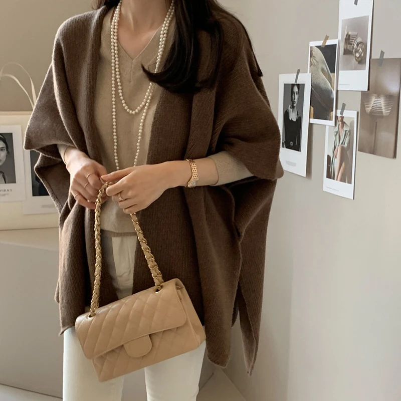 Модная элегантная вязаная куртка с шалью в корейском стиле, женский повседневный свободный теплый плащ, топ, однотонный вязаный кардиган, свитер, пальто 
Модная элегантная вязаная куртка с шалью в корейском стиле, женский повседневный свободный теплый плащ, топ, однотонный вязаный кардиган, свитер, пальто