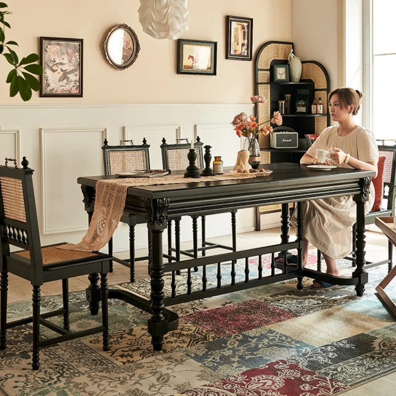 French retro solid wood dining table American carved desk worktable black table and chair combination
French retro solid wood dining table American carved desk worktable black table and chair combination