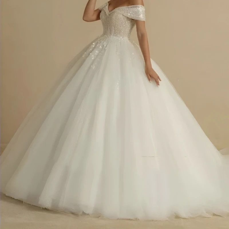 Customized Plus Size Princess Wedding Dresses 2026 For Bride Off Shoulder Sleeveless Women Glitter Ball Bridal Gown
Customized Plus Size Princess Wedding Dresses 2026 For Bride Off Shoulder Sleeveless Women Glitter Ball Bridal Gown