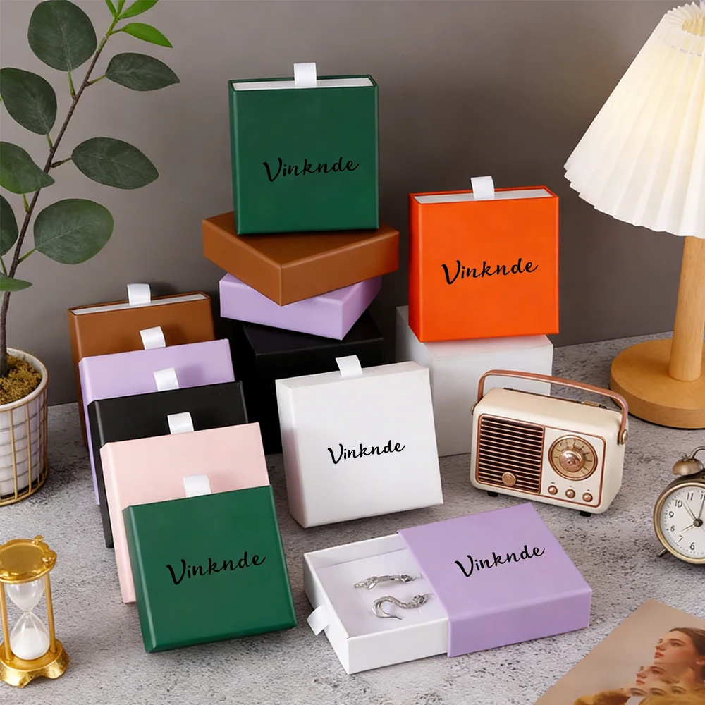 Custom Logo Luxury Rigid Sliding Packaging Drawer Gift Box of High-end Jewelry Clothing Cosmetics 8x8x3.2cm Coffee Earring Boxes
Custom Logo Luxury Rigid Sliding Packaging Drawer Gift Box of High-end Jewelry Clothing Cosmetics 8x8x3.2cm Coffee Earring Boxes