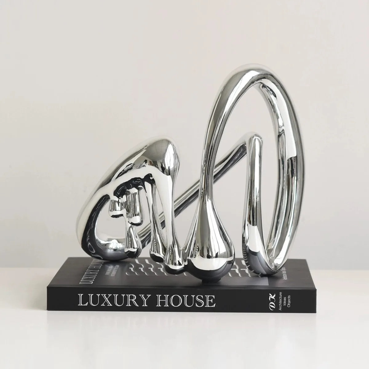PYJ high-end sense abstract art special-shaped electroplating creative high-end light luxury decoration soft decoration
PYJ high-end sense abstract art special-shaped electroplating creative high-end light luxury decoration soft decoration