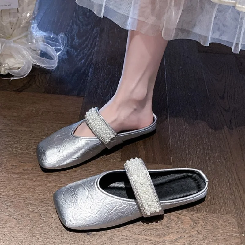 Лето 202, туфли-лодочки на плоской подошве, женская обувь, тапочки с открытой пяткой, женские дизайнерские сандалии с квадратным носком и бусинами, модельные модные женские шлепанцы
Лето 202, туфли-лодочки на плоской подошве, женская обувь, тапочки с открытой пяткой, женские дизайнерские сандалии с квадратным носком и бусинами, модельные модные женские шлепанцы