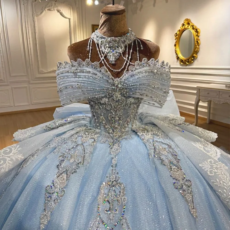 Light Blue Quinceanera Dress off-shoulder Sequins Crystal Decal Lace layering Long tail Bow vestidos de 15 Quinceanera Customiz
Light Blue Quinceanera Dress off-shoulder Sequins Crystal Decal Lace layering Long tail Bow vestidos de 15 Quinceanera Customiz