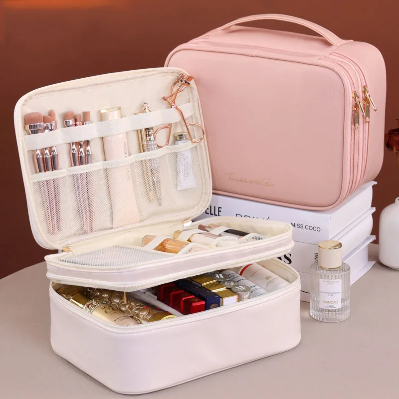 Двухслойная косметичка из искусственной кожи, большая вместительная женская сумка для хранения косметики, водонепроницаемый портативный ручной кейс для макияжа
Двухслойная косметичка из искусственной кожи, большая вместительная женская сумка для хранения косметики, водонепроницаемый портативный ручной кейс для макияжа