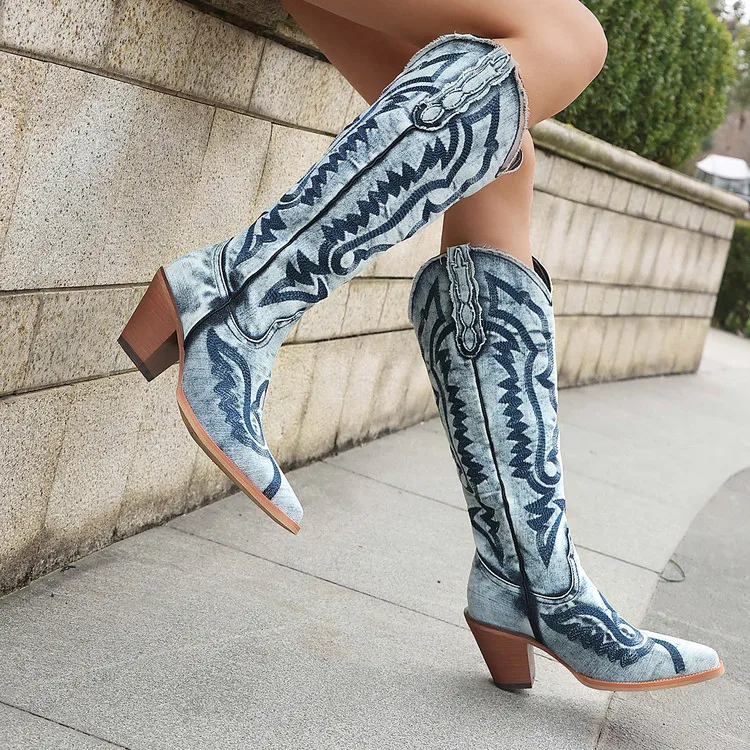 Вышитые ковбойские сапоги на массивном каблуке до колена
Вышитые ковбойские сапоги на массивном каблуке до колена