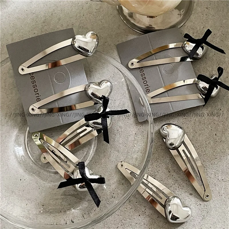Chic Silver Heart Water Drop BB Clips with Bow Detailing for Girls Bangs Non Slip Lightweight Metal Hair Accessories Comfortable
Chic Silver Heart Water Drop BB Clips with Bow Detailing for Girls Bangs Non Slip Lightweight Metal Hair Accessories Comfortable