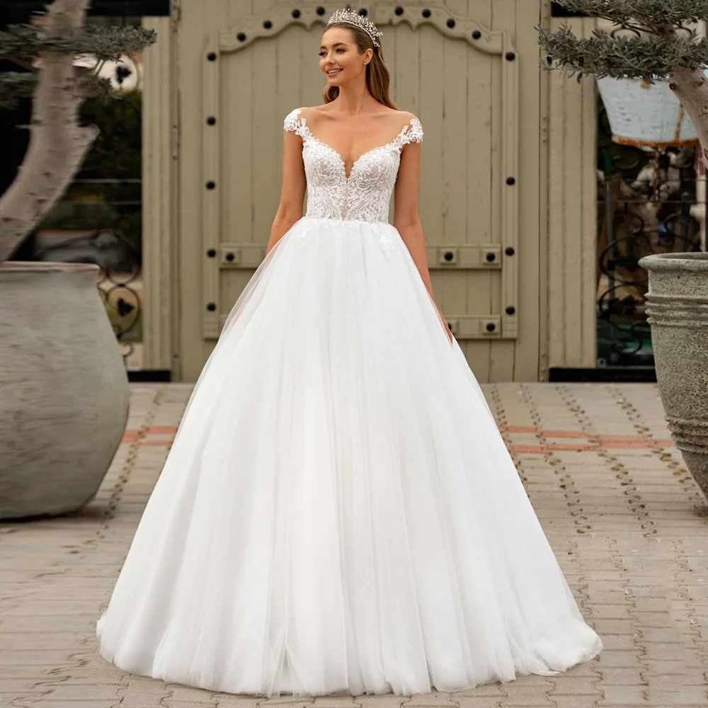 Gorgeous Princess Wedding Dresses A-line Lace Bridal Gown Cap Sleeves Sweep Train Garden Bride Dress Robe de Mariee
Gorgeous Princess Wedding Dresses A-line Lace Bridal Gown Cap Sleeves Sweep Train Garden Bride Dress Robe de Mariee